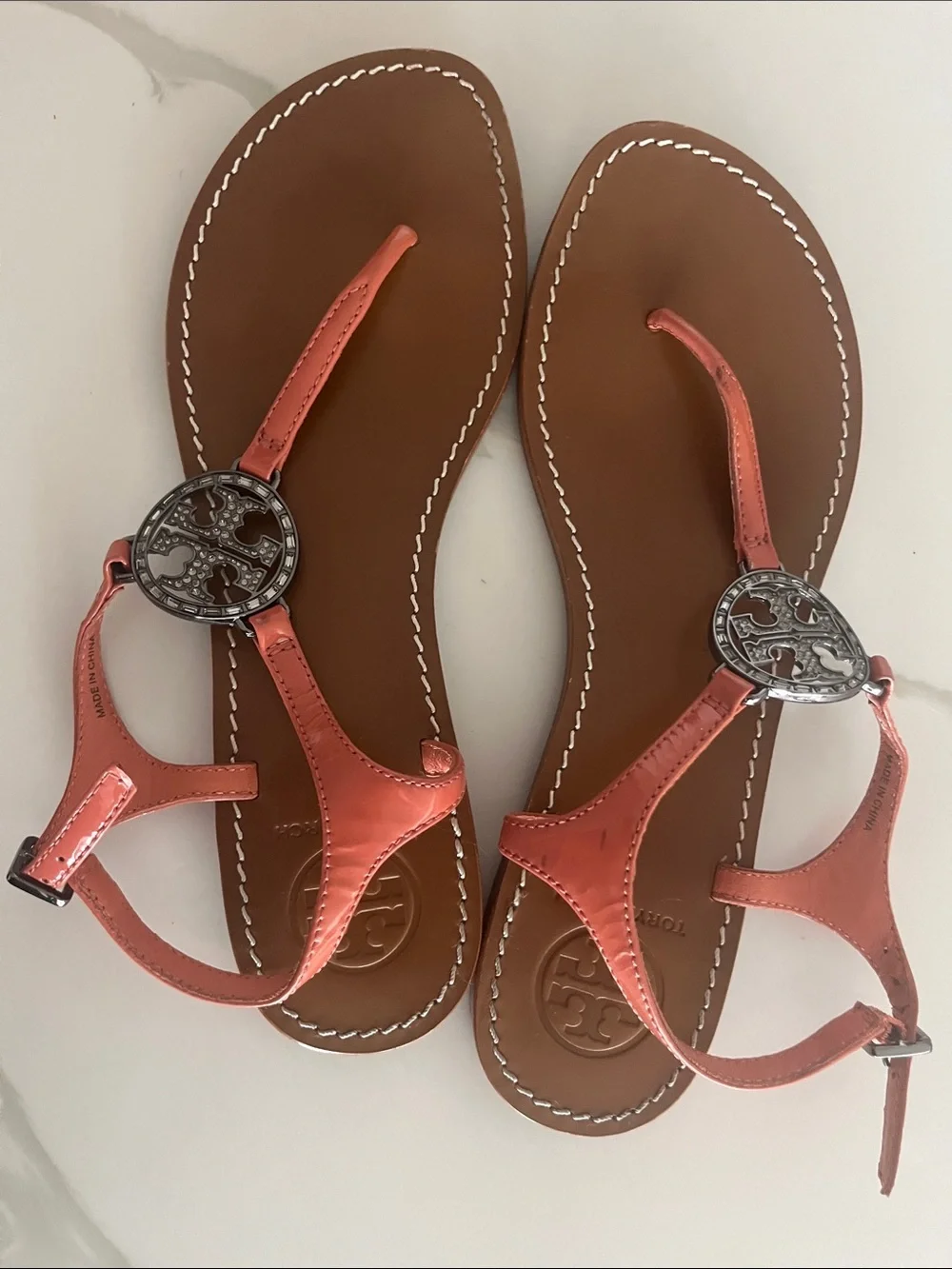 Tory Burch Coral Patent T-Strap Sandals with Logo Disc
